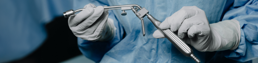 A surgeon holding a urethroscope